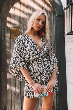 Flawless Touch Front Tie Romper 12 Flawless Touch Front Tie Romper -Hanger Fashion 2101065023000 2021020117053600 feeaca60flawless express sample 12