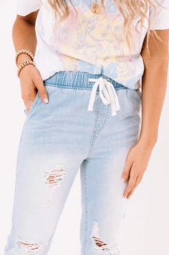 The Sabrina High Waist Distressed Relaxed Skinny In Light Wash 7 The Sabrina High Waist Distressed Relaxed Skinny In Light Wash -Hanger Fashion 2102042927000 2021030412452900 becb2701the sabrina high waist distressed relaxed skinny in light wash