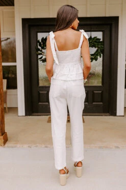 The Lari High Waist Button Up Trousers In Ivory -Hanger Fashion 2302236579000 2023030914143500 7c71e34dthe lari high waist button up trousers