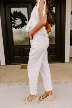 The Lari High Waist Button Up Trousers In Ivory -Hanger Fashion 2302236579000 2023030914143500 9d3e7d3ethe lari high waist button up trousers