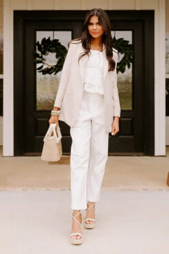 The Lari High Waist Button Up Trousers In Ivory