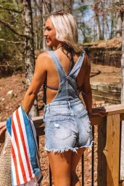 The Zoe Distressed Overalls -Hanger Fashion 2303101895000 2023042713055700 a11be101the zoe distressed overalls